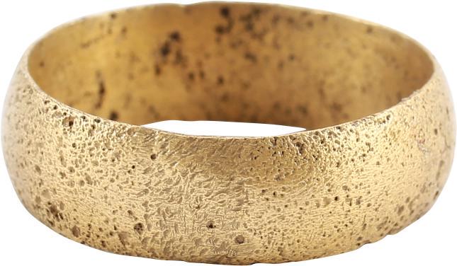 VIKING WARRIOR’S WEDDING RING, 10-11 CENTURY AD SIZE 9: Size 9. Broad rounded face band 6.6mm width. Cut with a large X, well into its working life. Probably commemorating an anniversary. Surface lightly textured from burial. Professionally refurbished wit
