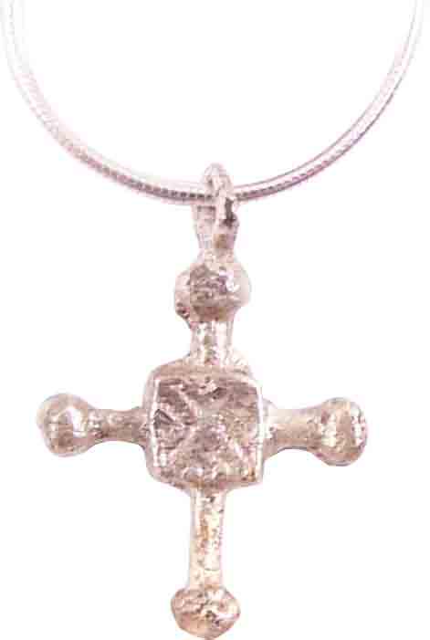 MEDIEVAL SAXON CONVERT’S CROSS NECKLACE C.800-1000 AD: Silvered bronze. Elegant form, slightly under 1” height, with spherical beam terminals. The junction of the beams with a square enclosing a saltire both sides. The emergence from the Dark Ages is em