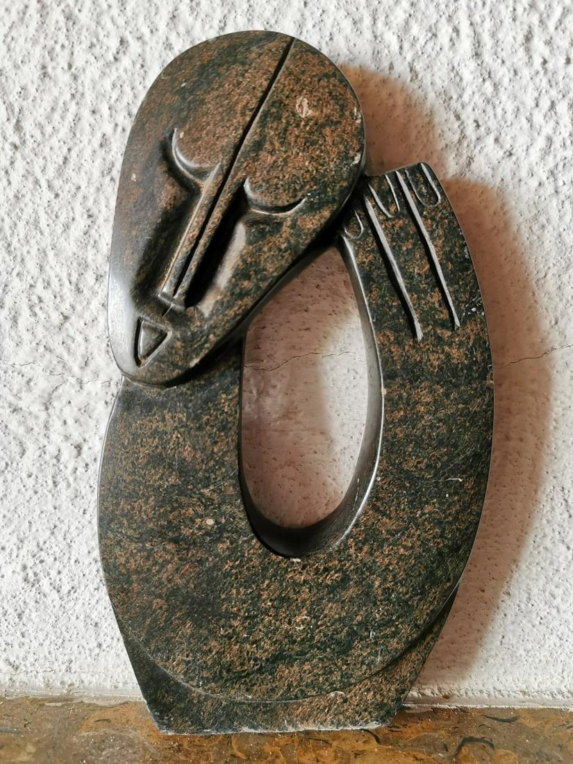 Stone Shona Stilized Human figure: Title: Stone Shona Stilized Human figure Date/Period: 20th C Materials: Stone like serpentine, soapstone, etc. Dimension: 18(H) x 10,7(L) cm Description: Shona sculpture is the name given to a modern 