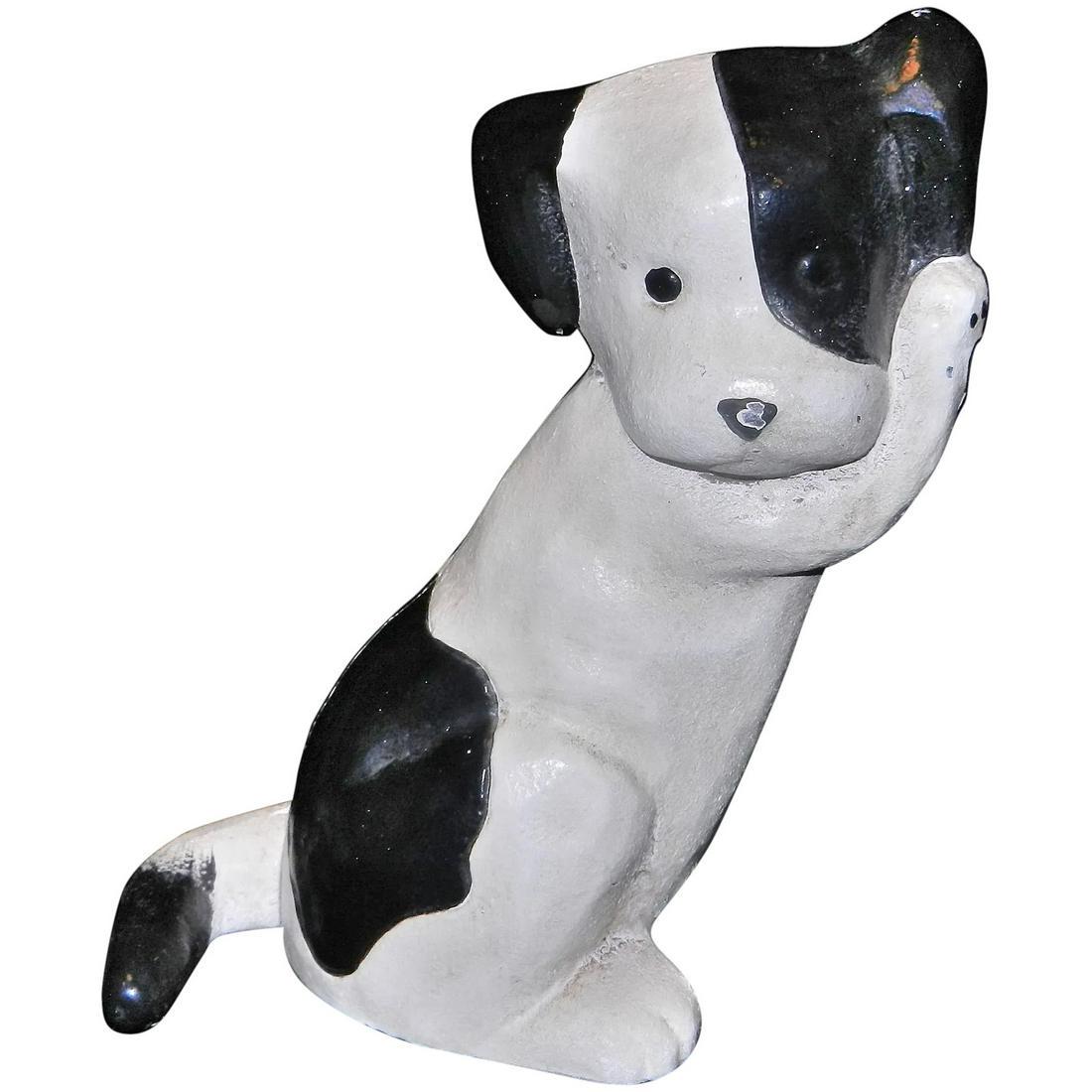 Vintage MCF Black and White Puppy Doorstop: This Vintage MCF Black and White Puppy Doorstop is in very good to excellent condition. NO missing paint or rust. Very heavy so it will hold any door. Measures 6 ¾Â” tall, MCF stands for Midwest C