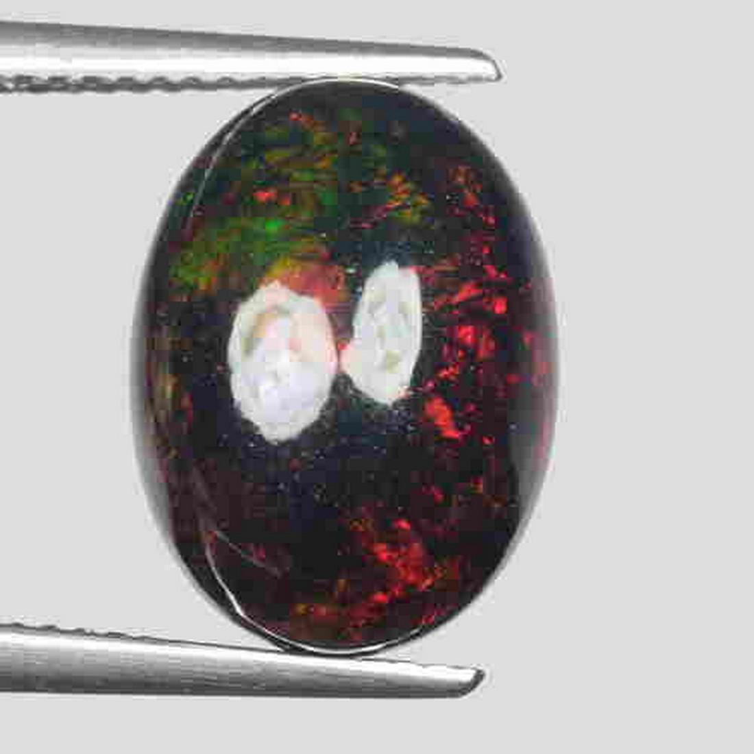4.10 CTS NATURAL ETHIOPIAN BLACK OPAL OVAL SHAPE GOOD (1 of 2)