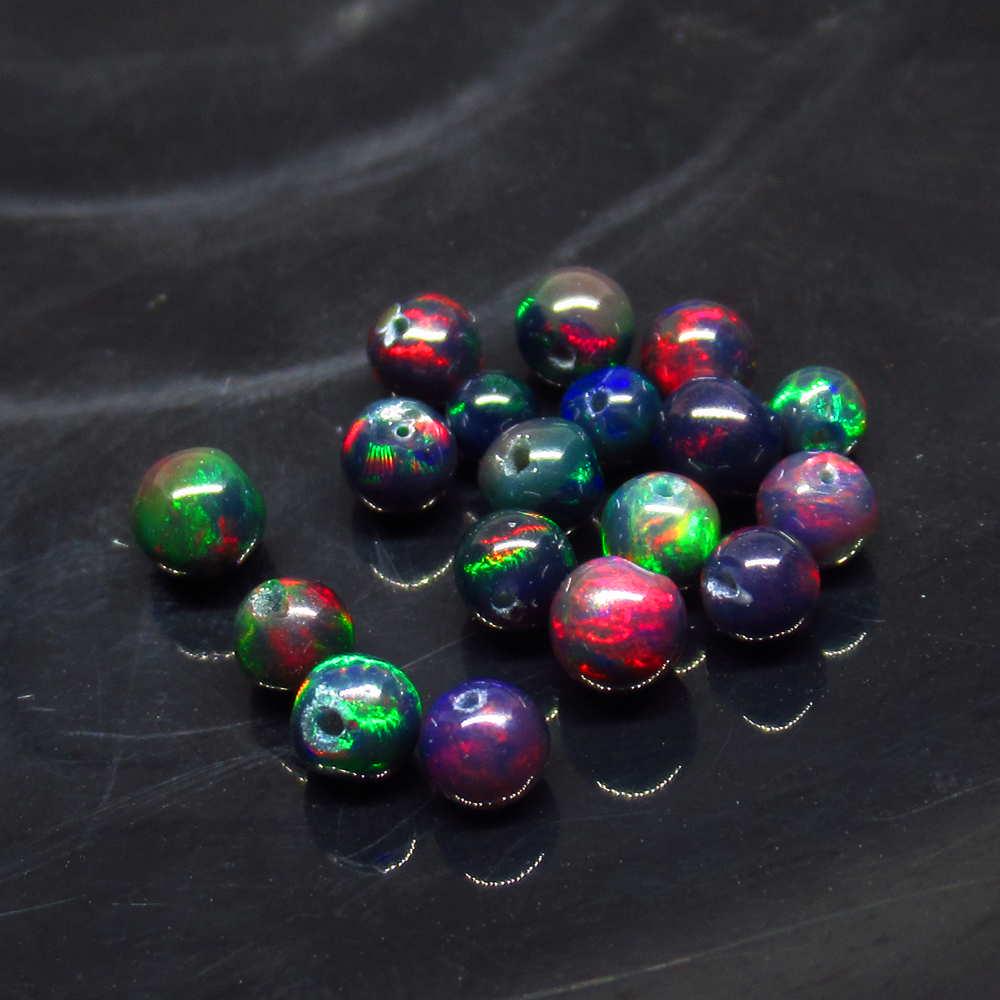 4.62 Ct Natural 18 Drilled Black Fire Opal Ball Beads: No Reserve! Title: 4.62 Ct Natural 18 Drilled Black Fire Opal Ball Beads Stone Clarity: Translucent Gemstone: Natural Black Opal Beads Carat Weights: 4.62 Size/Dimensions: 3.20 to 4.30 mm / 18 PC's Dr