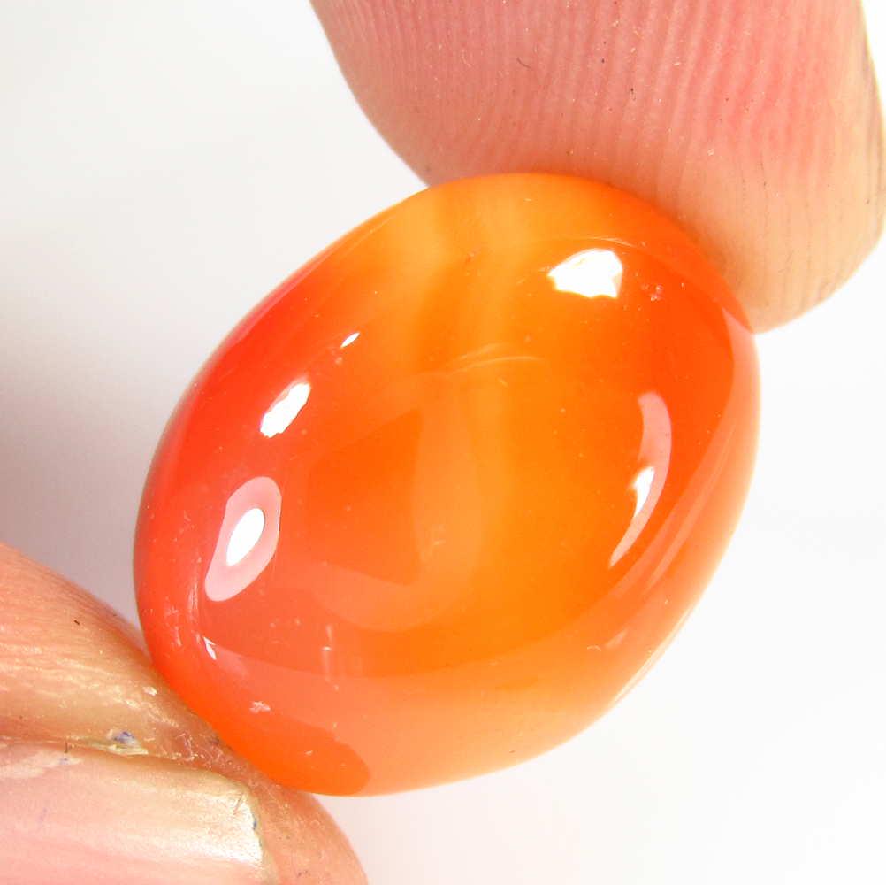 12.84 Ctw Natural Carnelian Oval Cab: No Reserve! Title: 12.84 Ctw Natural Carnelian Oval Cab Stone Clarity: Semi-Transparent Gemstone: Carnelian Carat Weight: 12.84 Size/ Dimensions: 17.00 x 13.00 x 7.00 mm Excellent Oval Cabochon / Orig