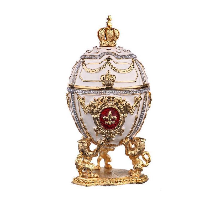 Decorative Faberge Egg with Russian Emperor's Crown: DESCRIPTION: The egg is made alloy of non-ferrous metals, enamel, crystals. The top opens on a hinge and has a magnetic closure to keep the box securely shut. This piece is a unique one of a kind piec
