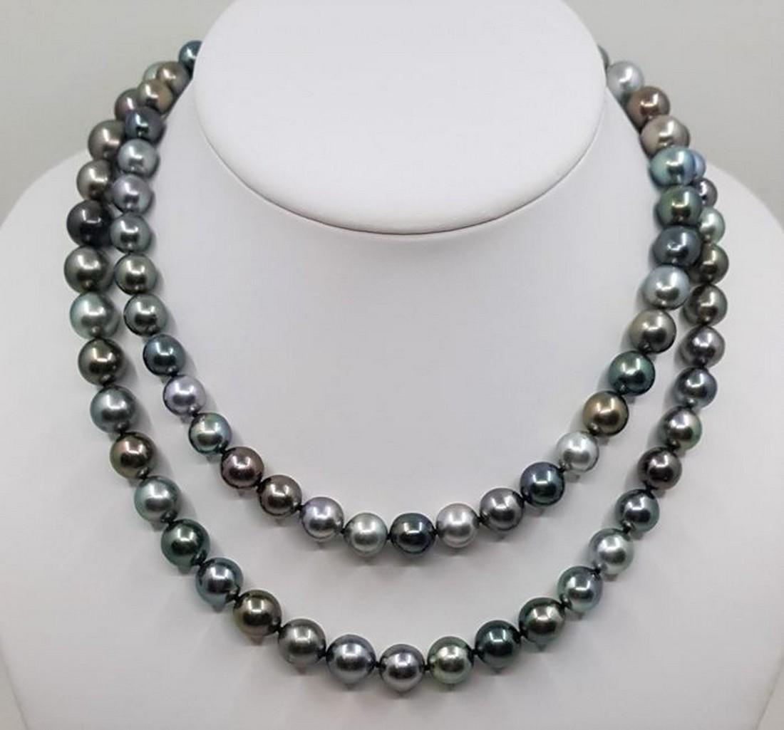 925 Silver - 8x11.5mm Shimmering Multi Tahitian Pearls: Title: 925 Silver - 8x11.5mm Shimmering Multi Tahitian Pearls - Long Necklace 90cm Description: Grown in the black-lipped Pinctada margaritifera oyster in the tropical waters of French Polynesia, thes