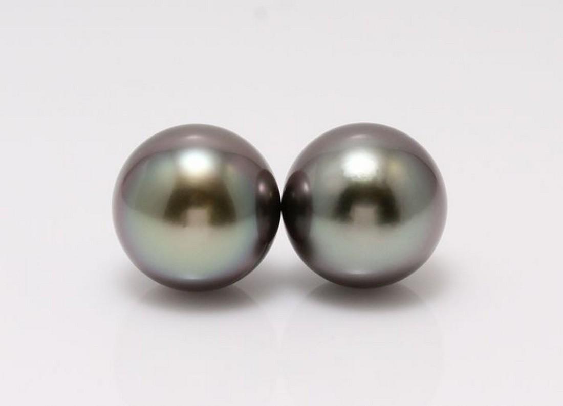 18 kt. White Gold - 10x11mm Peacock Tahitian Pearls -: Title: 18 kt. White Gold - 10x11mm Peacock Tahitian Pearls - Earrings Description: Produced by the Pinctada Margaritifera oyster in the tropical lagoons of French Polynesia, these pearls have a natura