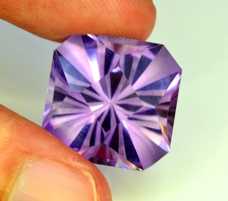 Amethyst Loose Gemstones from Afghanistan ~ 15.30: Material Gem type: Amethyst Description Natural Amethyst Loose Gemstones from Afghanistan. Weight : 15.30 carats Sizes : 15*15*11 mm Origin : Afghanistan Treatment : Natural DHL Express Shipping R36-9