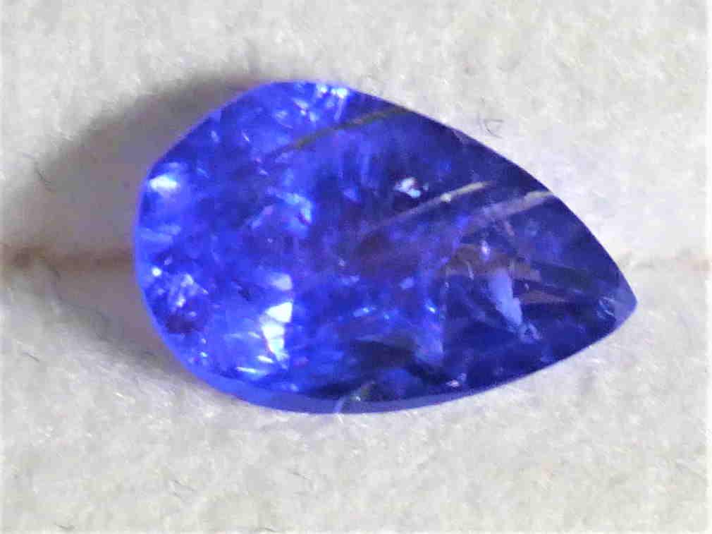 TANZANITE 1.31 ct **PEAR SHAPE** DEEP BLUE: Title: TANZANITE 1.31 ct **PEAR SHAPE** DEEP BLUE Gemstones: Tanzanite Carat Weights: 1.31 ct Size/Dimensions: 9.20 x 6.30 x 4.00 mm Reserve: $70.00 Shipping: Domestic: Flat-rate of $18.00 to anywhere