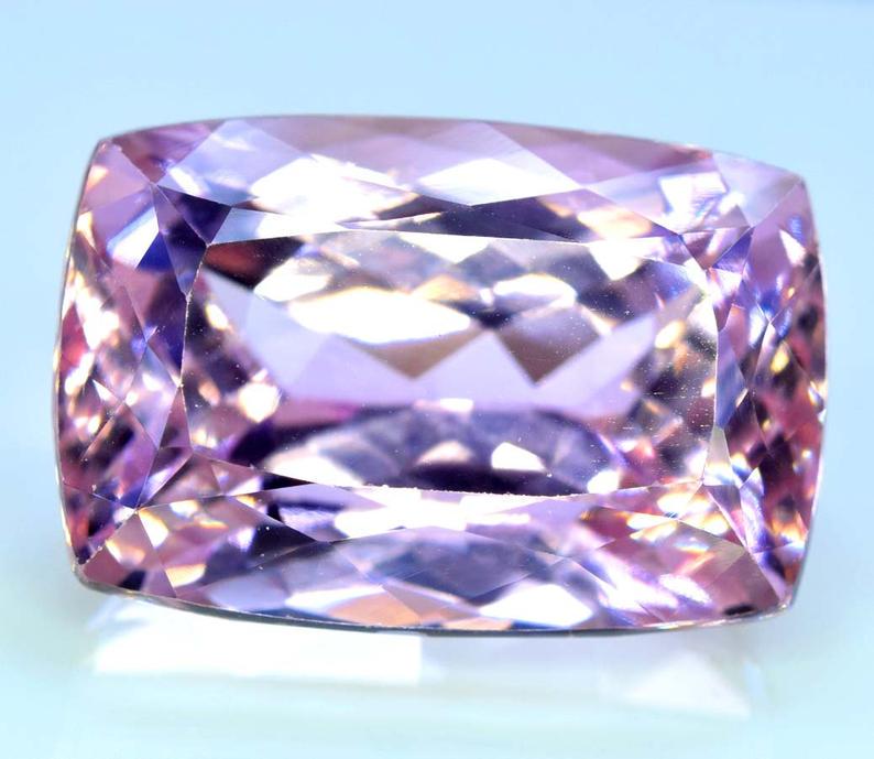 Kunzite Gemstone , Top Quality Pink Color Natural: Material kunzite more Description Kunzite Gemstone , Top Quality Pink Color Natural Kunzite Gemstone Weight : 41 Carats Size : 22*14*14 mm Treatment : Natural Origin : Afghanistan DHL Express Shipping