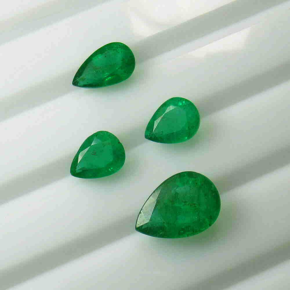 6.70 Ct Natural 4 Zambian Emerald Pear Set (1 of 2)