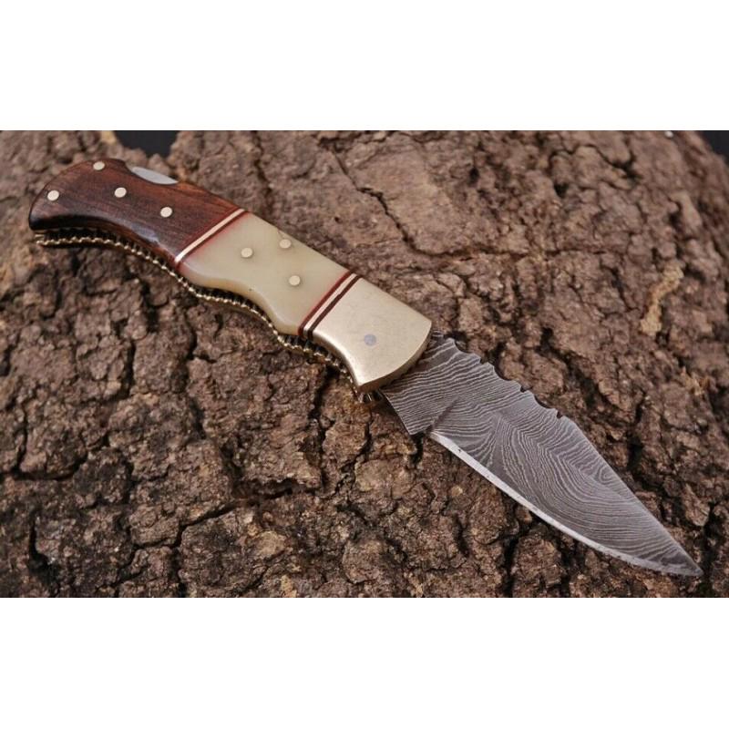 Wild Damascus steel knife Wood & Bone With Brass: Knife "Slave" made of damask steel. Handle – Wood & Bone With Brass Bolster, scabbard - leather. Damascus knives are very durable, look great and keep sharpness perfectly. Damascus steel has high qu