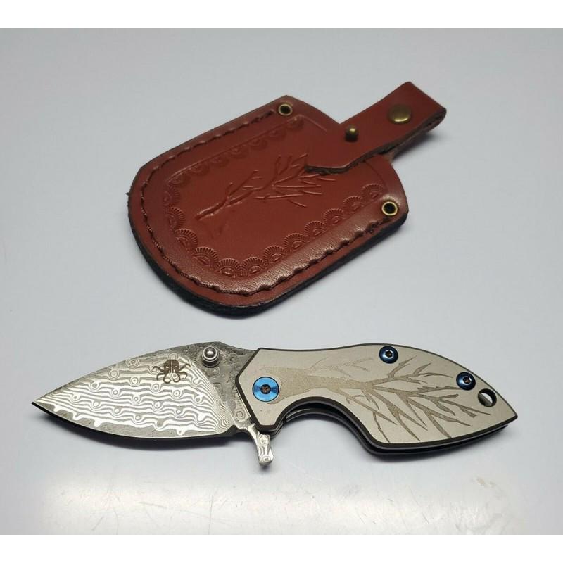 Hunting Damascus steel knife TC4 handmade haking: Knife "Lils" made of damask steel. Handle – TC4, scabbard - leather. Damascus knives are very durable, look great and keep sharpness perfectly. Damascus steel has high quality contents to give it an