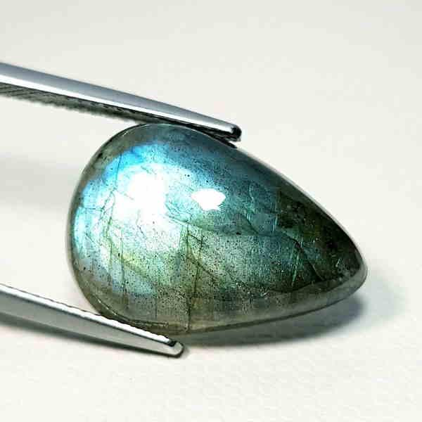 11.90 ct Natural Labradorite: No Reserve! Title: 11.90 ct Natural Labradorite Color/Clarity: Opaque Carat Weights: 11.9 Dimensions: 19.00 x 13.20 x 6.30 Additional Information: Pear - USA Shipping: Domestic: Flat-rate of $10.00 t