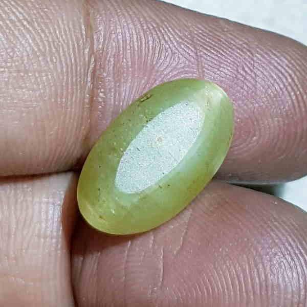 12.03 ct Top Quality Natural Apatite cat's Eye: No Reserve! Title: 12.03 ct Top Quality Natural Apatite cat's Eye Color/Clarity: Semi -Transparent Carat Weights: 12.03 Dimensions: 15.80 x 9.20 x 9.50 Additional Information: Oval - Jharkhand Shippin