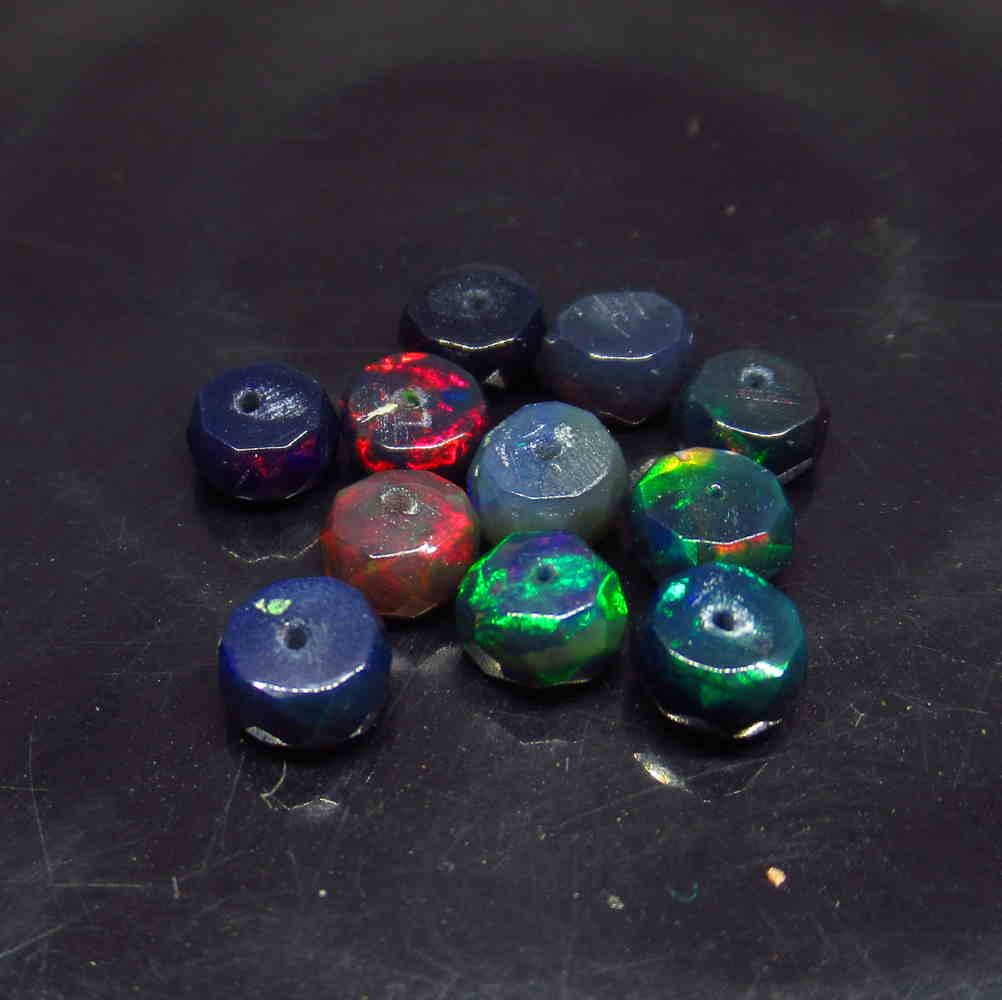 3.95 Ctw Natural 11 Drilled Faceted Black Opal Beads: No Reserve! Title: 3.95 Ctw Natural 11 Drilled Faceted Black Opal Beads Stone Clarity: Translucent Gemstones: Faceted Black Opal Beads Size/Dimensions: 3.95 Carat Weights: 4.60 to 5.60 mm / 11 PC's Ad