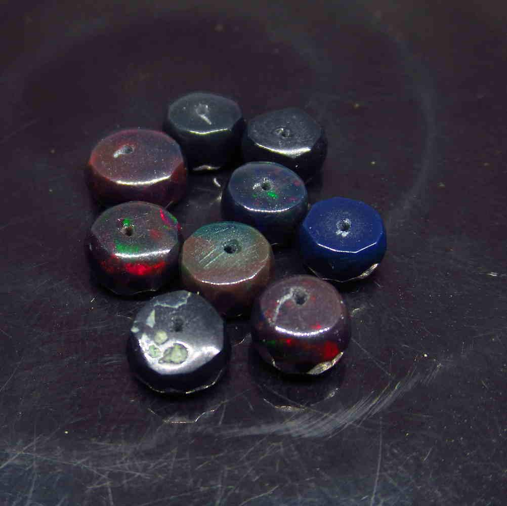 6.39 Ctw Natural 10 Drilled Faceted Black Opal Beads: No Reserve! Title: 6.39 Ctw Natural 10 Drilled Faceted Black Opal Beads Stone Clarity: Translucent Gemstones: Faceted Black Opal Beads Size/Dimensions: 6.39 Carat Weights: 6.00 to 6.60 mm / 10 PC's Ad