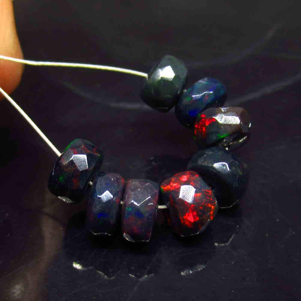 5.47 Ctw Natural 8 Drilled Faceted Black Opal Beads: No Reserve! Title: 5.47 Ctw Natural 8 Drilled Faceted Black Opal Beads Stone Clarity: Translucent Gemstones: Faceted Black Opal Beads Size/Dimensions: 5.47 Carat Weights: 6.00 to 6.40 mm / 8 PC's Addi