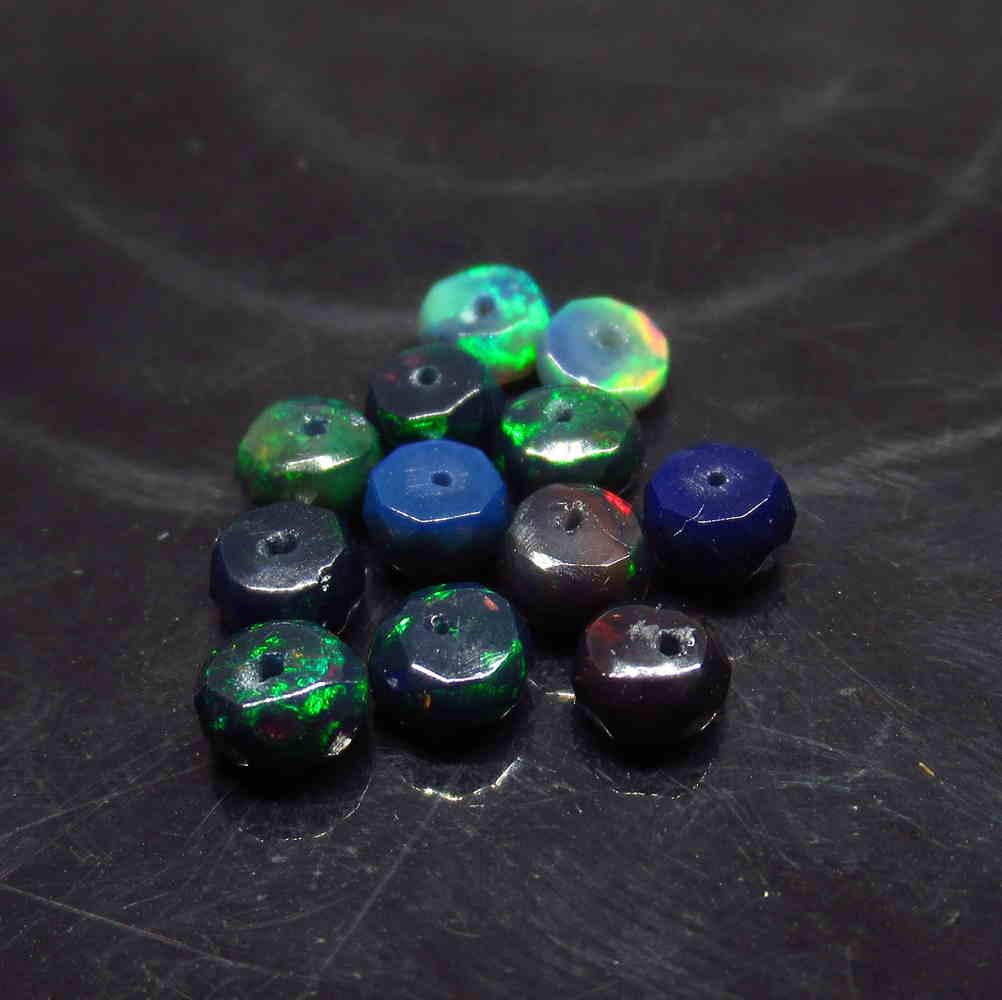 3.79 Ctw Natural 13 Drilled Faceted Black Opal Beads: No Reserve! Title: 3.79 Ctw Natural 13 Drilled Faceted Black Opal Beads Stone Clarity: Translucent Gemstone: Faceted Black Opal Beads Carat Weight: 3.79 Size/Dimensions: 4.10 to 4.80 mm / 13 PC's Addi