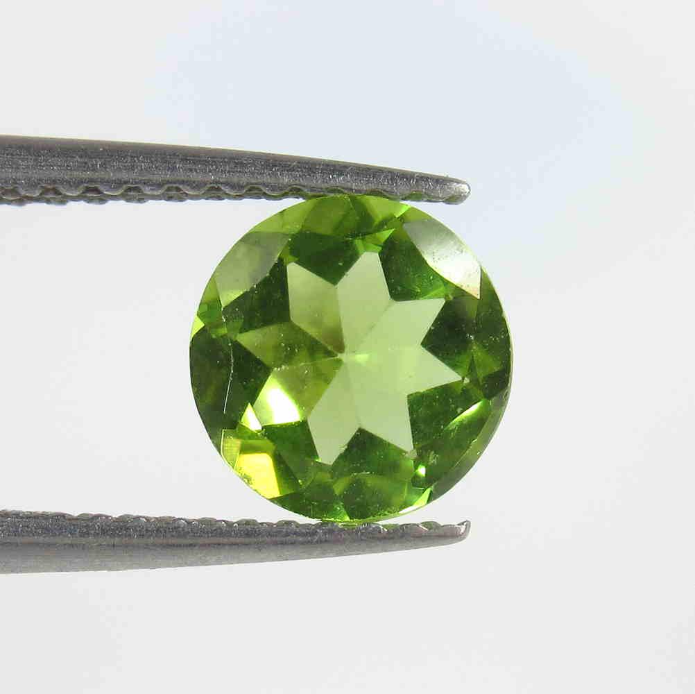 1.24 Ctw Natural Pakistan Peridot Round Cut: No Reserve! Title: 1.24 Ctw Natural Pakistan Peridot Round Cut Stone Clarity: VVS Gemstone: Peridot Carat Weight: 1.24 Size/Dimensions: 7.00 x 7.00 x 3.80 mm Additional Information: Top Class Luster /