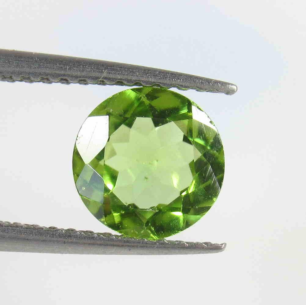 1.36 Ctw Natural Pakistan Peridot Round Cut: No Reserve! Title: 1.36 Ctw Natural Pakistan Peridot Round Cut Stone Clarity: VVS Gemstone: Peridot Carat Weight: 1.36 Size/Dimensions: 7.20 x 7.20 x 3.80 mm Additional Information: Top Class Luster /