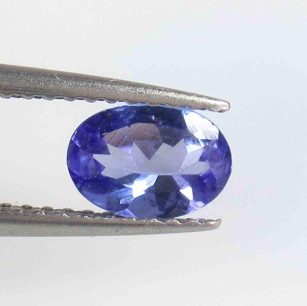 0.60 Ctw Natural Tanzanite Oval Cut: No Reserve! Title: 0.60 Ctw Natural Tanzanite Oval Cut Stone Clarity: VVS Gemstone: Tanzanite Carat Weight: 0.6 Size/Dimensions: 7.00 x 5.00 x 2.90 mm Additional Information: Top Quality Luster / Exce