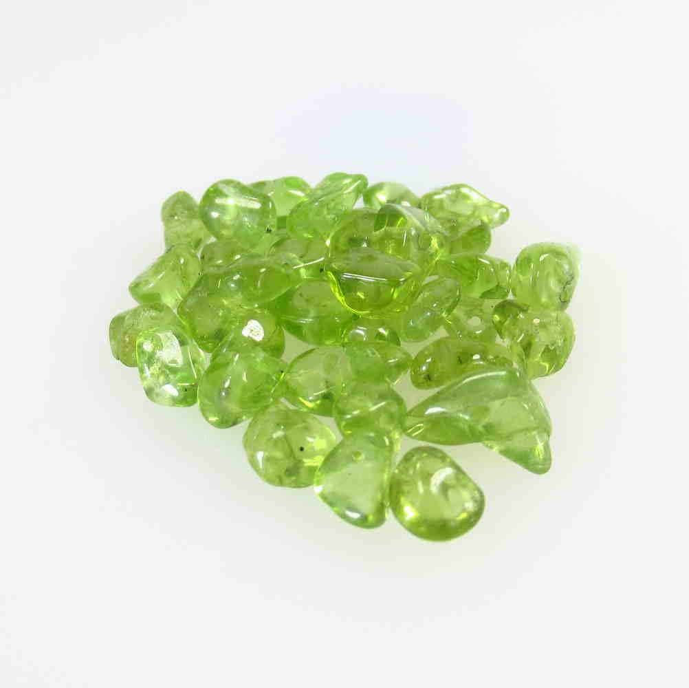 22.29 Ct Natural 36 Drilled Pakistan Peridot Unshaped: No Reserve! Title: 22.29 Ct Natural 36 Drilled Pakistan Peridot Unshaped Beads Stone Clarity: VVS Gemstones: Natural Peridot Beads Carat Weights: 22.29 Size/Dimensions: 4.8x3.5 - 7.0x3.5 mm / 36 PC's 