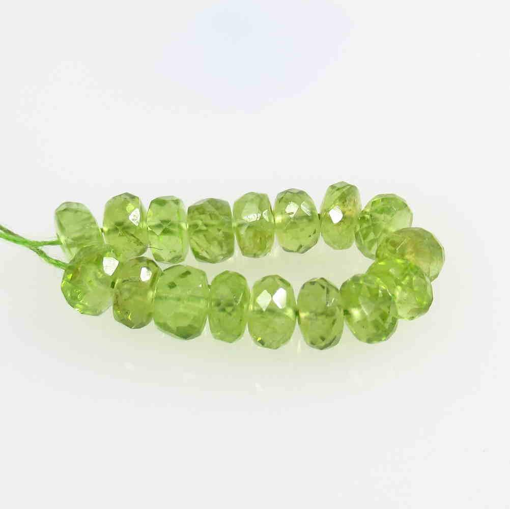 7.36 Ct Natural 17 Drilled Pakistan Peridot Round Beads: No Reserve! Title: 7.36 Ct Natural 17 Drilled Pakistan Peridot Round Beads Stone Clarity: VVS Gemstones: Natural Peridot Beads Carat Weights: 7.36 Size/Dimensions: 4.30 - 4.60 mm / 17 PC's Additional 