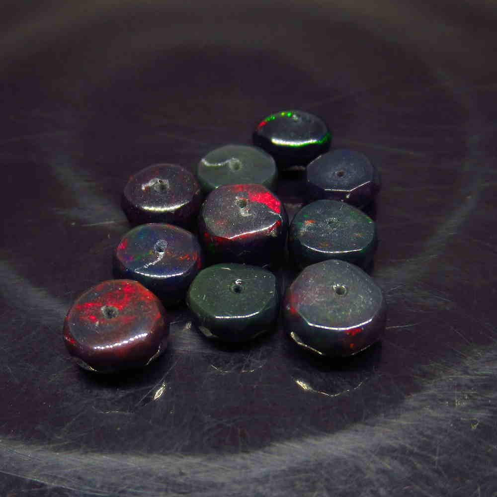6.62 Ct Natural 10 Drilled Faceted Black Fire Opal: No Reserve! Title: 6.62 Ct Natural 10 Drilled Faceted Black Fire Opal Beads Stone Clarity: Translucent Gemstone: Natural Faceted Black Opal Beads Carat Weight: 6.62 Size/Dimensions: 5.60 to 6.00 mm / 