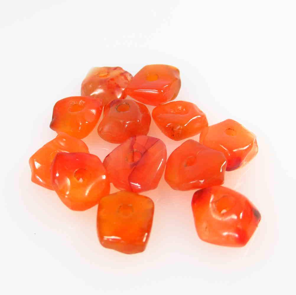 24.67 Ct Natural 12 Drilled Orange Carnelian Unshaped: No Reserve! Title: 24.67 Ct Natural 12 Drilled Orange Carnelian Unshaped Beads Stone Clarity: Semi-Transparent Gemstone: Natural Carnelian Beads Carat Weight: 24.67 Size/Dimensions: 9.5x8.3 - 11.0x10.