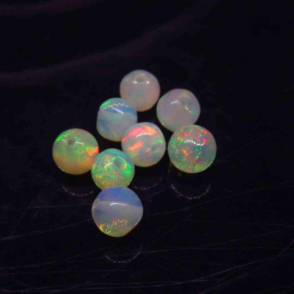 2.27 Ct Natural 8 Drilled Multi-Color Fire Opal Ball (1 of 2)