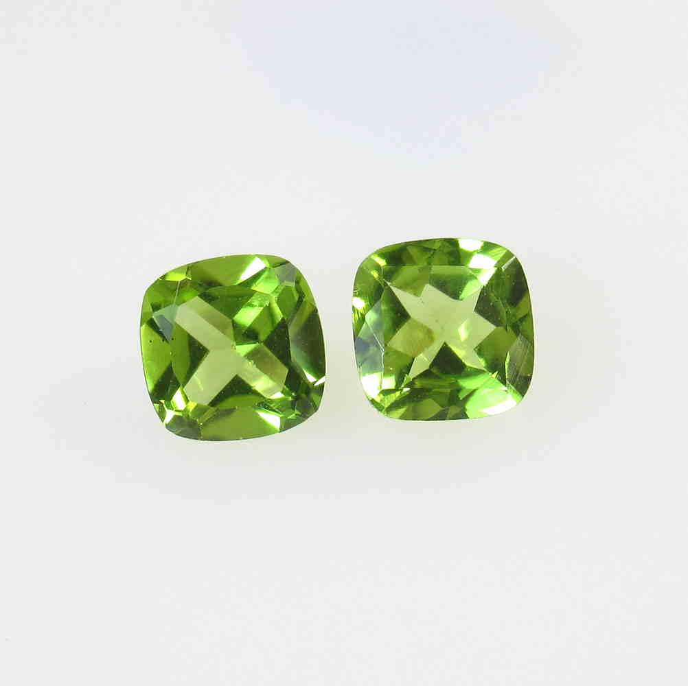 3.00 Ct Natural Pakistan Peridot Cushion Pair: No Reserve! Title: 3.00 Ct Natural Pakistan Peridot Cushion Pair Stone Clarity: VVS Gemstone: Natural Peridot Carat Weight: 3 Size/Dimensions: 7.00 x 7.00 x 4.00 mm / 2 PC's Additional Information: To