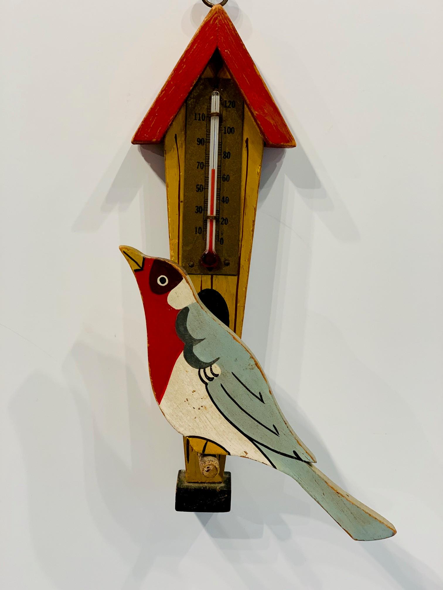 Bird on a Birdhouse perch Thermometer, early 20th c: Title: Bird on a Birdhouse perch Thermometer, early 20th c Dimensions: 10" x 4” Circa: Early 20th c Description: Charming Bird in vivid colors perched on a folk art proportioned birdhouse with a fau