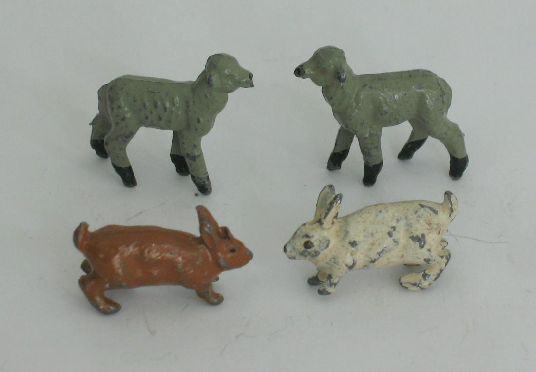 Early cast metal lambs and rabbits.: Title: Early cast metal lambs and rabbits. Description: Nice early cast metal lambs & rabbits in original paint. Made in Britain. Dimension: 1” each Circa: 1900's Shipping: Domestic: Flat-rate of $1