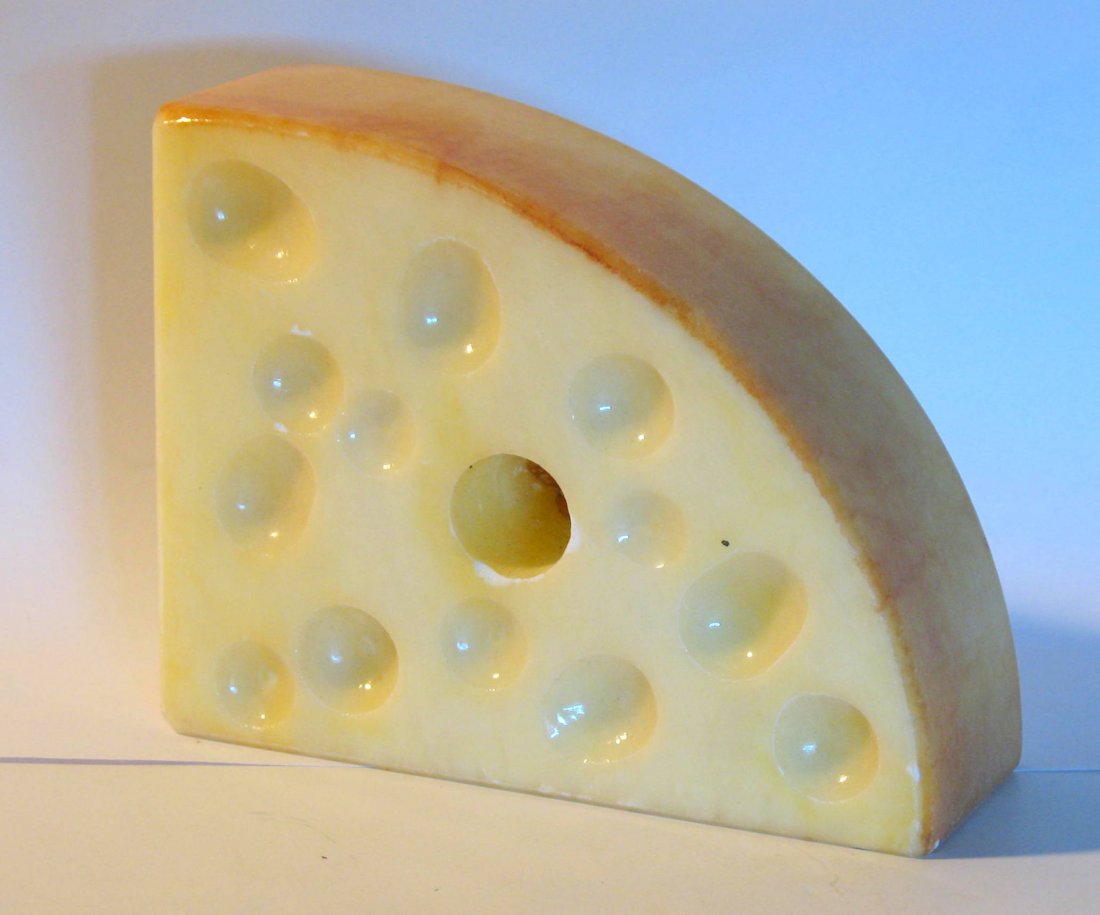 Vintage wedge of stone cheese. (1 of 6)