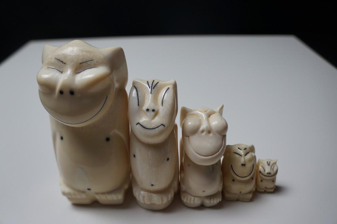Huge! INUIT Billiken Family - Scrimshaw: Title: Huge! INUIT Billiken Family - Scrimshaw Origin: Alaska Date/Period: Mid 20th century Materials:Tusk Size: From 4.5 to 1 inches tall - 615 grams Description: Alaskan Native group of billikens Sh