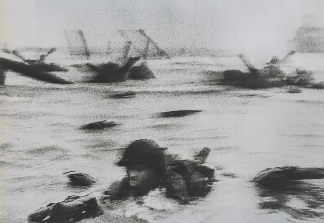 ROBERT CAPA - Normandy Invasion on D-Day, 1944: Artist: ROBERT CAPA Title: Normandy Invasion on D-Day, 1944 Medium: Photo Litho, 1996, Hong Kong Dimensions: 8.95x6.25" Description: Heat Wax Mounted on 11x14" Conservation Board The Story: On D-Day,
