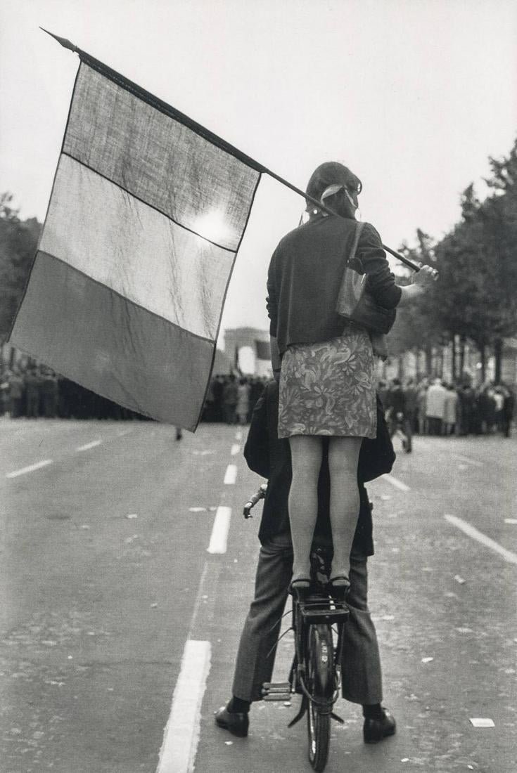 HENRI CARTIER-BRESSON - Champs-Elysees, Paris 1968: Artist: HENRI CARTIER-BRESSON Title: Champs-Elysees, Paris 1968 Medium: Photo Litho, 2000, Italy Dimensions: 5.7x85" Description: Heat Wax Mounted on 8.5x11" Conservation Board The Story: In this phot