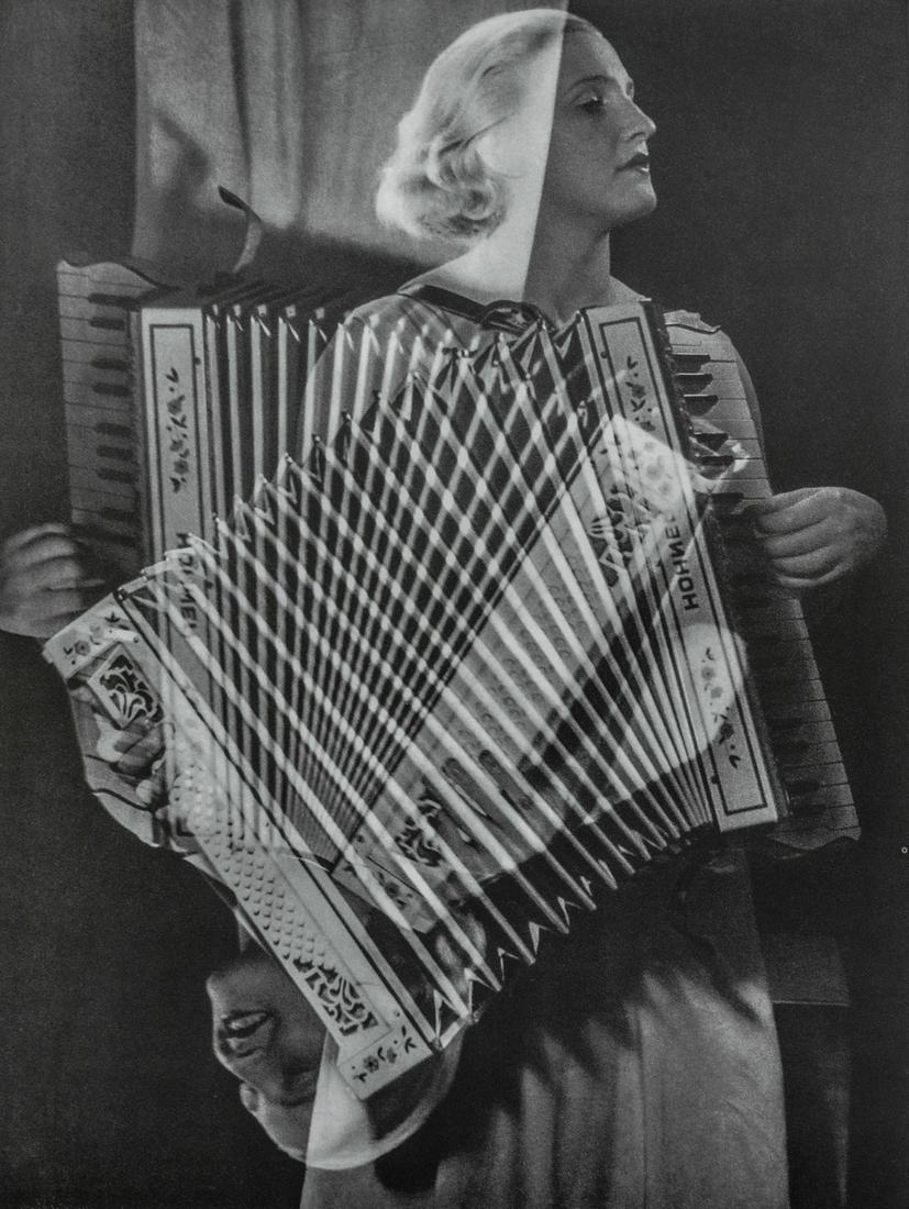 MAN RAY - Eva with Accordian: Artist: MAN RAY Title: Eva with Accordian Medium: Photo Litho, 2000, Italy Dimensions: 8.45x11.15" Description: Heat Wax Mounted on 11x14" Conservation Board Artist Bio: Man Ray, original name Emmanue
