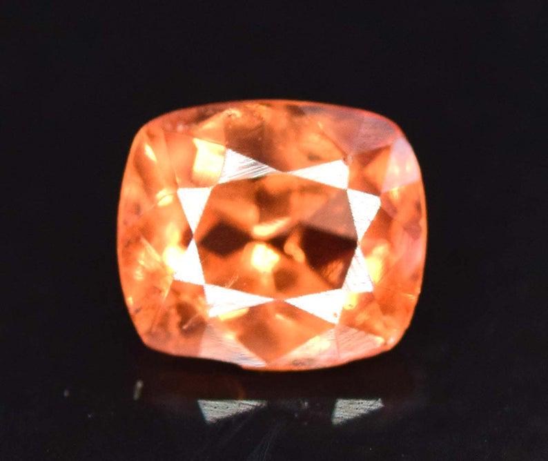 Triplite Gemstone , Rare Natural Top Color Triplite: Material Triplite more Dimensions Carat weight: 0.70 Description 0.80 Carats Rare Natural Top Color Triplite Gemstone - Weight : 0.70 Carats Size : 5*4*3 mm Treatment : Natural Origin : Pakistan DH