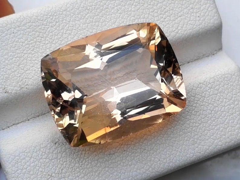 Morganite, 24.35 Carats Lovely Morganite Gemstone: Material Morganite more Dimensions Carat weight: 24.35 Description Product Video link: https://df2sm3urulav.cloudfront.net/tenants/gr/uploads/movies/1265000-1269999/1265847/5f3ba6464e730.mp4 Dimension