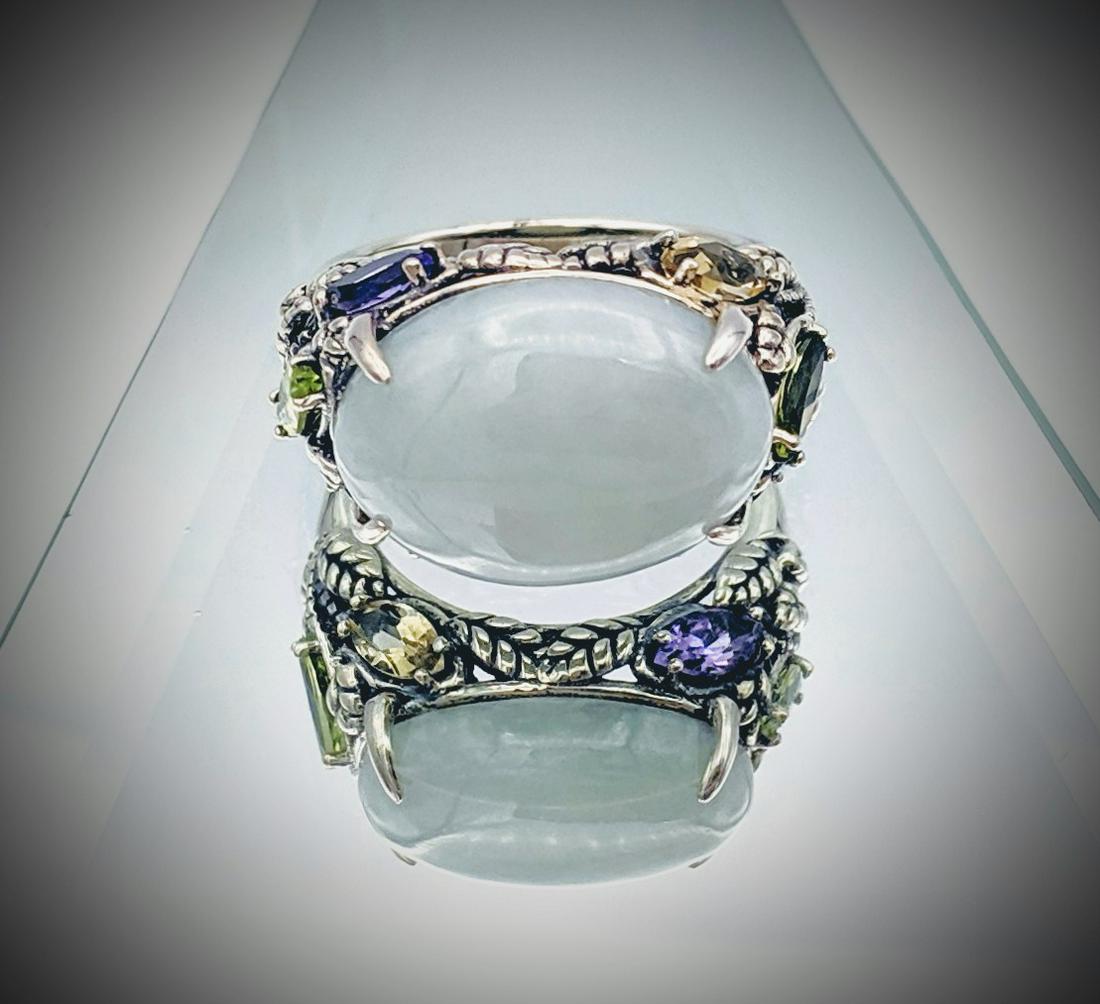 Sz 7 Peridot, Amethyst, Yellow Beryl & Jade Ring: Brand: Jean Lin Collection Title: Sz 7 Peridot, Amethyst, Yellow Beryl & Jade Ring Metal Purity: 925 Sterling Silver Gemstones: Peridot, Amethyst, Yellow Beryl& Jade Carat Weight: 1 Oval Jade at 17.7�