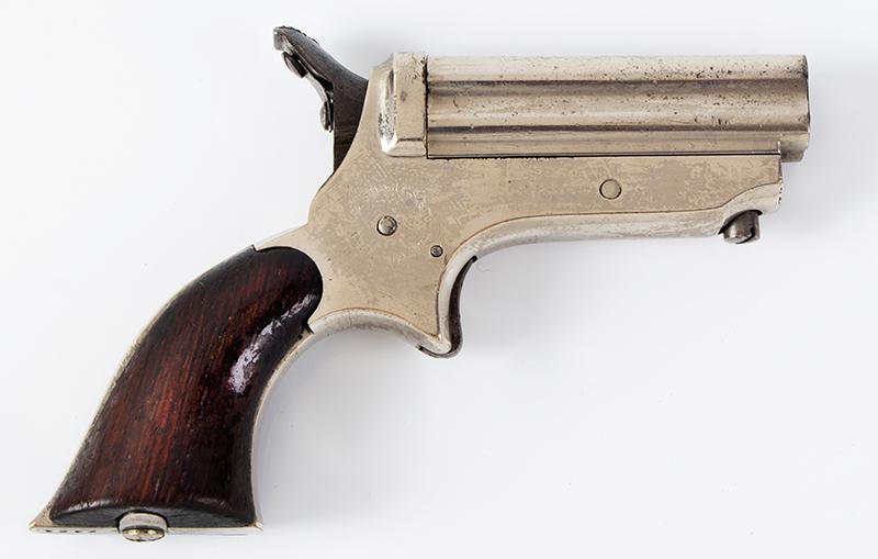 Sharps Model Derringer Pepperbox, Model 1C 4-Barrel: 308-527 Title: Sharps Model Derringer Pepperbox, Model 1C 4-Barrel Date/Period: Measurement: .22-Caliber, serial number 7964 Additional Information: Sharps Model Derringer Pepperbox, Model 1C 4-Barrel