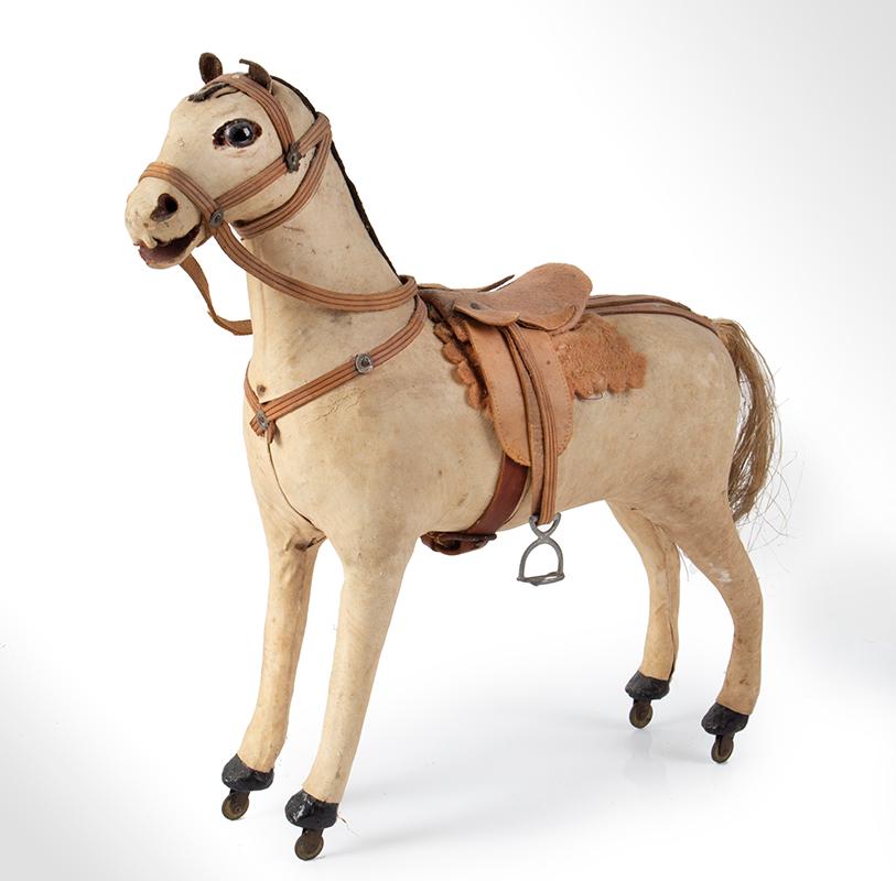 Horse Pull Toy: 1064-8 Title: Horse Pull Toy Date/Period: German c 1920 Measurement: 11.5"x 11" Additional Information: Nice German horse pull toy, c 1910. Horse is covered in hide with plastic eyes, leather ears, ha