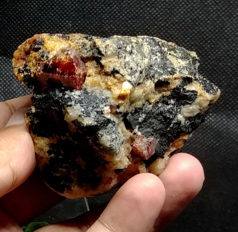 200 Grams Amazing Red Zircon With Aegrine Specimen From: Material zircon specimen more Description Product: Zircon Orign: Skardu Pakistan Shape: Specimen Size: 66*54*42 mm Weight: 200 Grams Treatment: Natural Color: Red Reserve: $30.00 Shipping: