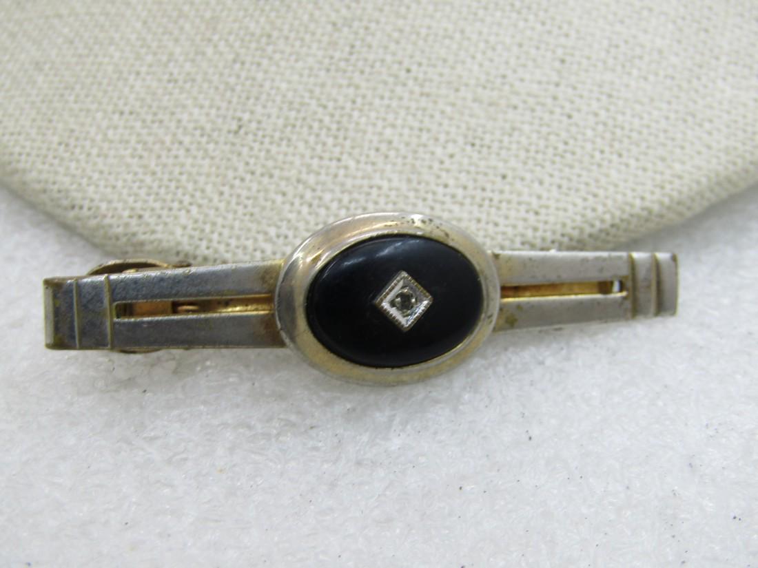 Vintage Art Deco Tie Clasp, Gold Tone, 1950's-1960's,: Vintage Art Deco Tie Clasp, Gold Tone, 1950's-1960's, Signed County Club.ÿ 2.25" long and appx. 5/8" wide in the center where there is a 5/8 by 1/2" black bezel-set oval with a diamond recessed area 