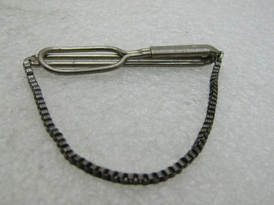 Vintage Swank Sterling Silver Tie Bar with Chain,: Vintage Swank Sterling Silver Tie Bar with Chain, 194's, marked sterling and pat. No. 1865995. It is appx 6.45 grams and 2" wide. Signed Swank. Good to very good condition other than oxidation that ca