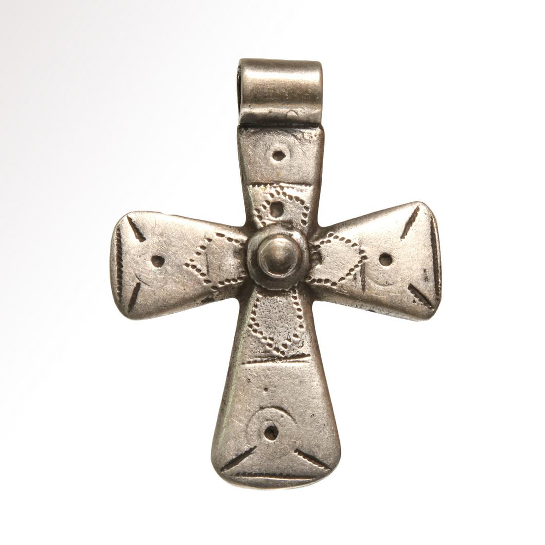 Viking Silver Cross with Punched and Engraved: Title: Viking Silver Cross with Punched and Engraved Decoration, 11th Century A.D. Date & Origin: Viking, c. 11th Century A.D. Material: Silver, 12.2 grms Dimension: 5.1 cm L (including loop) - 2 inch