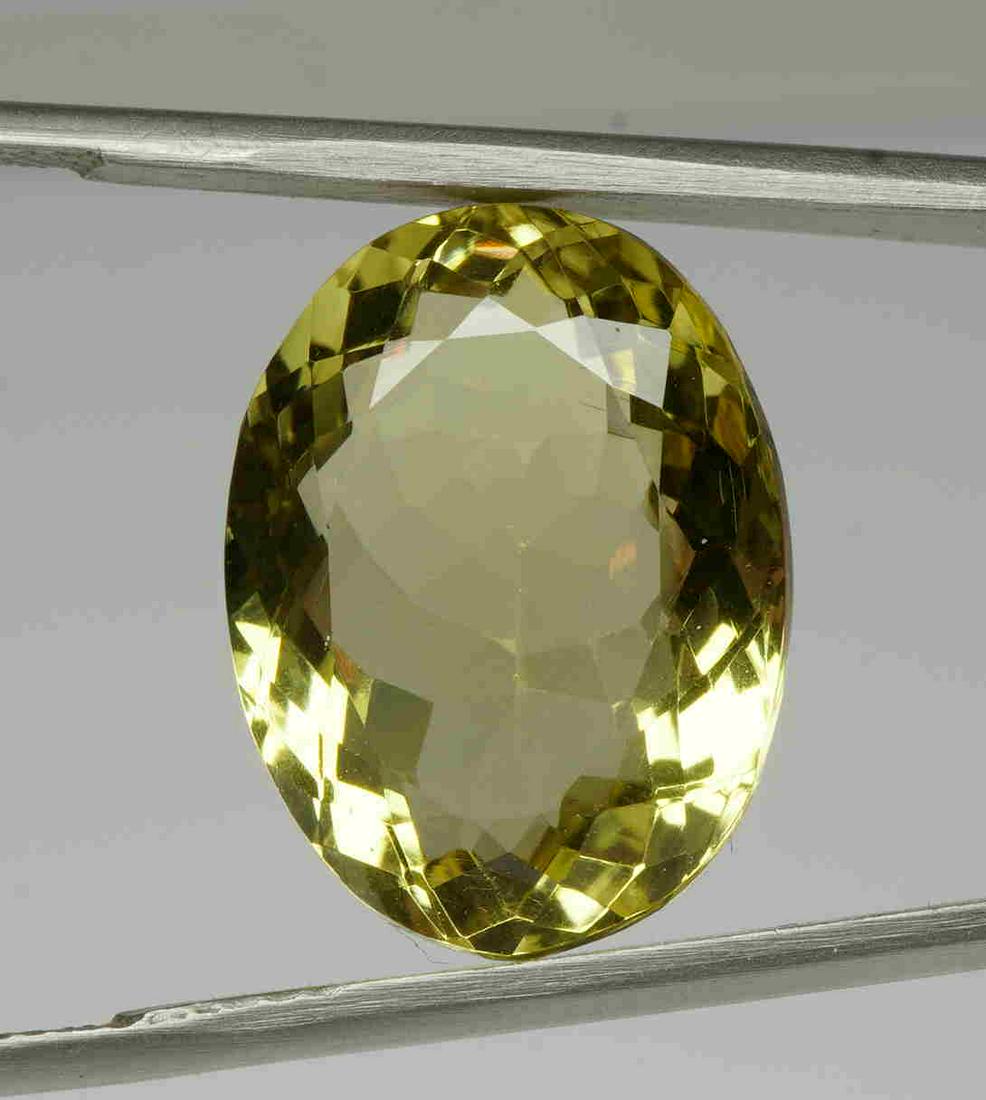 Natural 16.09 cts Lemon Quartz: Title: Natural 16.09 cts Lemon Quartz Shape: OVAL MIXED CUT Color: Greenish Yellow Gemstone Type: Natural Lemon Quartz Carat Weights: 16.09 cts Transparency: Transparent Origin: Russia Size/Dimensions