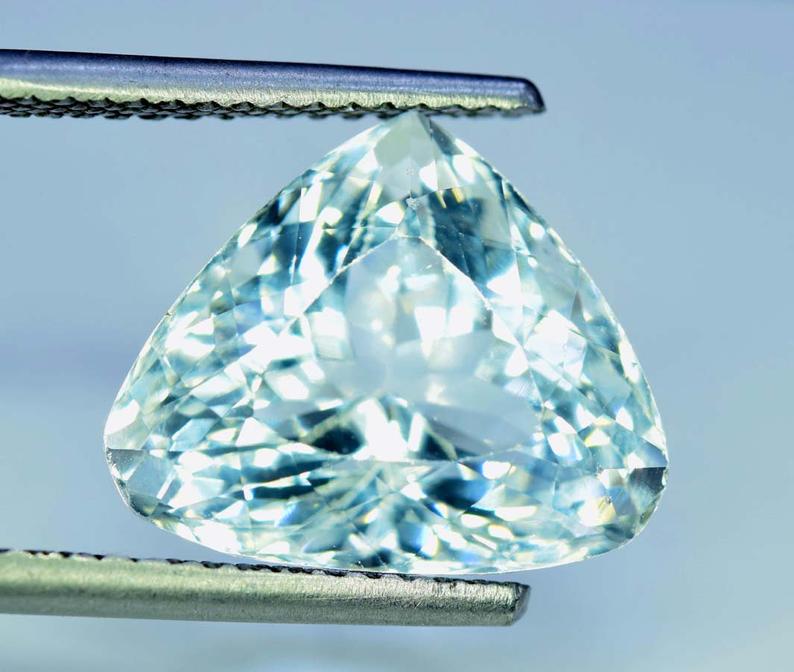 Aquamarine Gemstone , Oval Cut Natural Untreated: Material Aquamarine more Dimensions Carat weight: 12.30 Description Natural Untreated Aquamarine Gemstone From Pakistan Weight : 12.30 CTS Size : ~ 17*14*11 mm Treatment : Natural Origin : Pakistan