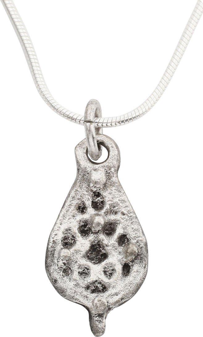 MEDIEVAL SPIRITUAL NECKLACE PENDANT C.1200-1400 AD: Europe, C.1200-1400 AD. Silvered bronze, about 7/8” length. Based on the duck’s foot pendants which Viking seers used and stylized as a matrix around a four-point star as was associated with the R